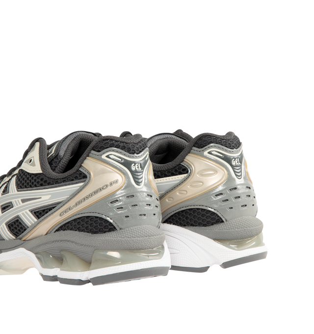 Image 3 of 5 - GREY - Asics GEL-Kayano 14 Sneakers are lace-up style with rip-stop underlays, GEL cushioning, and TRUSSTIC support system. Unisex style in men's sizing. 