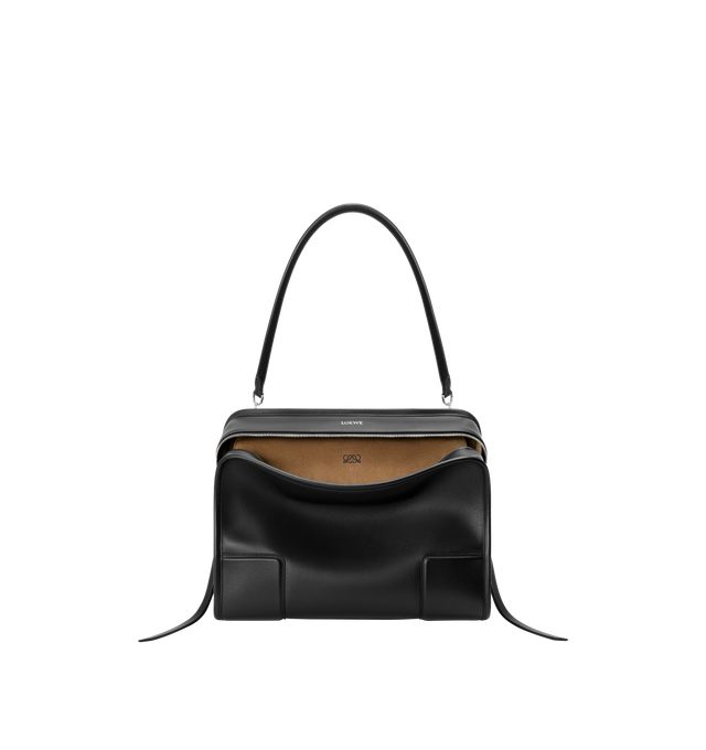 Image 7 of 16 - BLACK - Loewe Amazona 180 large bag takes on a relaxed silhouette anchored by a single toron top handle. It is designed to be carried open, while a concealed closure secures the main compartment. Removable shoulder and crossbody straps make it highly versatile. This large version is crafted in soft calfskin. Three carry options: short handle, removable shoulder strap and crossbody. Features zip closure with two leather zip pullers, two compartments, main compartment closed with magnetic clos 