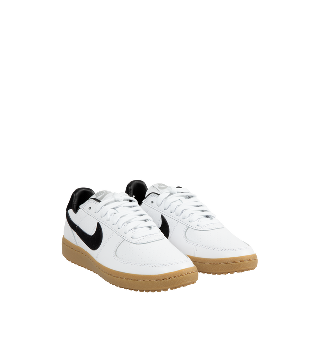 Image 2 of 5 - WHITE - Nike Field General '82 returns with gritty football style, smooth and perforated leather upper with black swoosh, nubby Waffle outsole with a Gum Light Brown finish.  