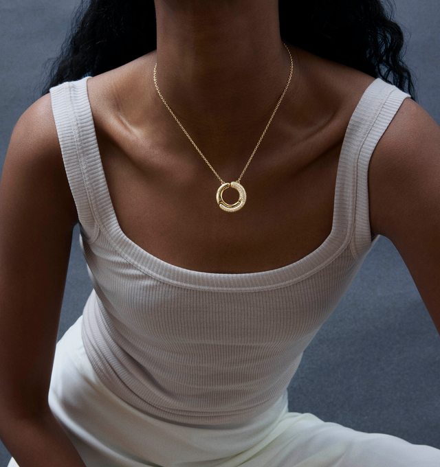 Image 3 of 5 - GOLD - PAMELA ZAMORE Holos Small Circle Diamond Necklace featuring two sculptural halves of a piece interlocking to become one. Hand-finished. 18K yellow gold, 16.5g. 1.17ct diamonds. Pendant diameter 25mm. Length: 16/18. Hirshleifers offers a range of pieces from this collection in-store. For personal consultation and detailed information about jewelry, please contact our dedicated stylist team at personalshopping@hirshleifers.com. This item may be restricted for online purchase to internati 