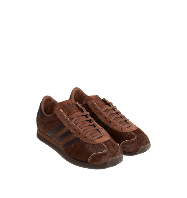 Image 2 of 5 - BROWN - ADIDAS Country Japan Sneaker featuring a pony hair upper, lace up closure, soft leather lining, regular fit and rubber outsole. 