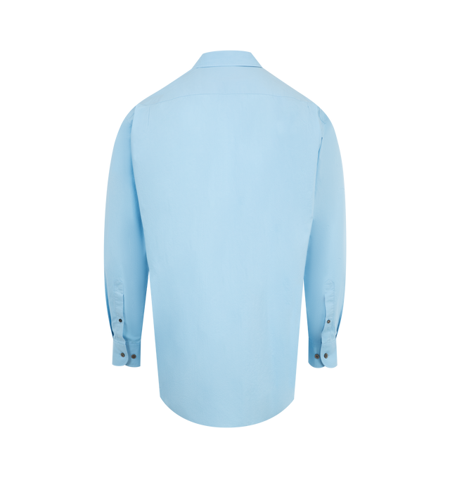 Image 2 of 2 - BLUE - THE ROW Miller Shirt featuring classic button-up shirt in washed cotton poplin with slim back yoke, curved hem, and exposed front placket with mother-of-pearl buttons. 100% cotton. Made in Italy. 
