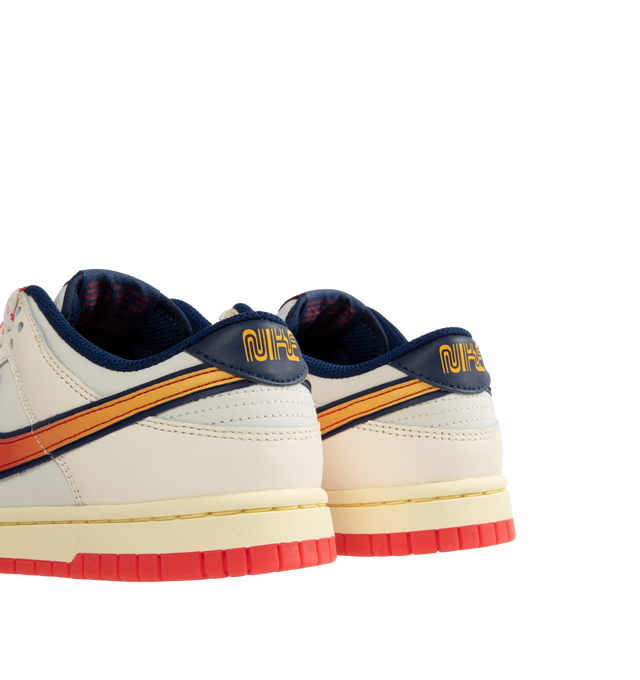 Image 3 of 5 - WHITE - NIKE Dunk Low Retro SE Sneaker featuring genuine leather upper, foam midsole, rubber outsole with classic pivot circle, padded collar and perforated toe box. 