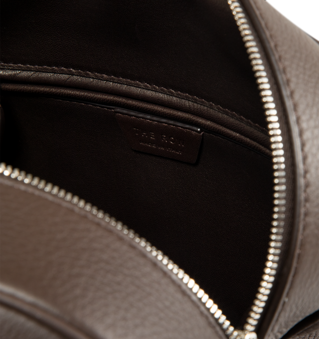 Image 3 of 3 - BROWN - THE ROW India 12.00 Bag in Leather featuring updated bowling bag in textured calfskin leather with tubular handles, branded metal padlock and key, and zipper closure. 11.81 x 4.72 x 9.45 in. Handle: 4.33 in. drop. 100% calfskin leather. Made in Italy. 