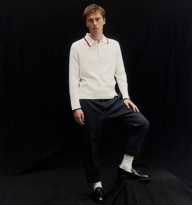 Image 4 of 5 - WHITE - THOM BROWNE Browne. 65 Jersey Polo featuring a sporty polo collar, Browne lettering and the number 65 on back, partial front button closure, buttoned side vents with signature striped grosgrain trim, buttoned cuffs with signature striped grosgrain trim and signature striped grosgrain loop tab. 100% cashmere. Made in Italy. 