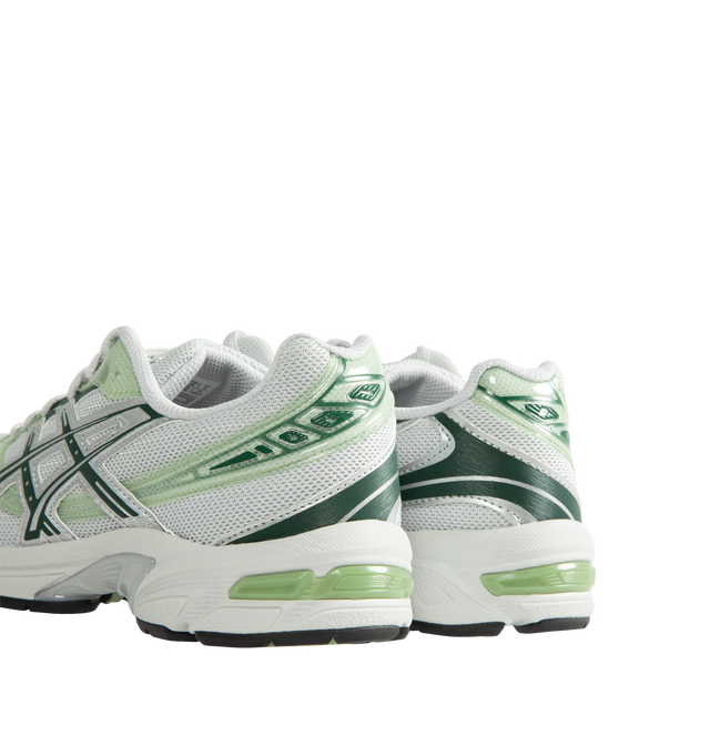 Image 3 of 5 - GREEN - Asics Unisex Gel-1130 Sneakers feature patent leather overlays, clear gloss TPU accents, and breathable mesh underlays for a modern look. Enhanced with cushioning and support designed for all-day comfort, the GEL-1130 delivers the perfect blend of heritage performance and everyday wearability. Main Material: Mesh Upper with Patent Leather and Gloss TPU Overlays. Cushioning: GEL Technology. Details: GEL-1000 Series Heritage Design, Breathable Mesh Construction *Unisex style in men's si 