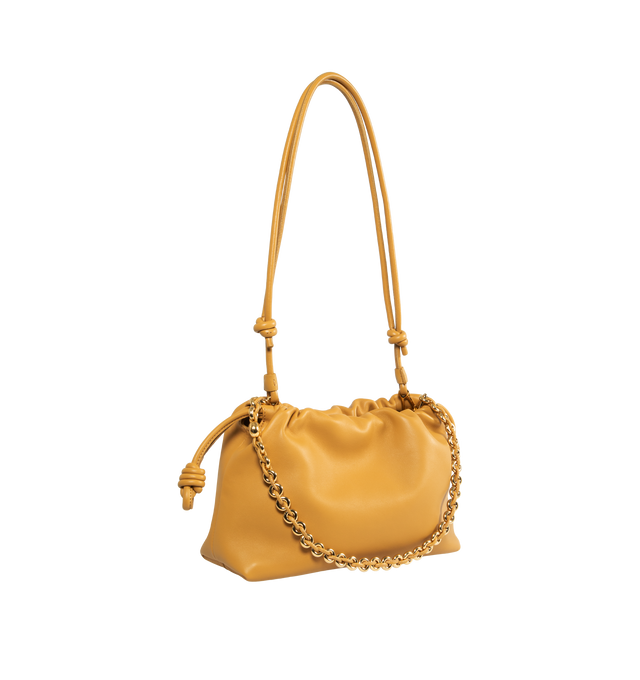 Image 2 of 5 - BROWN - Loewe Flamenco Purse crafted in mellow nappa lambskin in a ruched design featuring knots at the sides, magnetic closure and detachable donut chain. Versatile and functional, it can be carried as a clutch, worn over the shoulder using the donut chain or crossbody with the accompanying leather strap.  Nappa leather with suede lining. Height 7.9" X Width 11.8" X Depth 4.1". Adjustable Strap length (inches) 37" to 47". Made in Spain. 