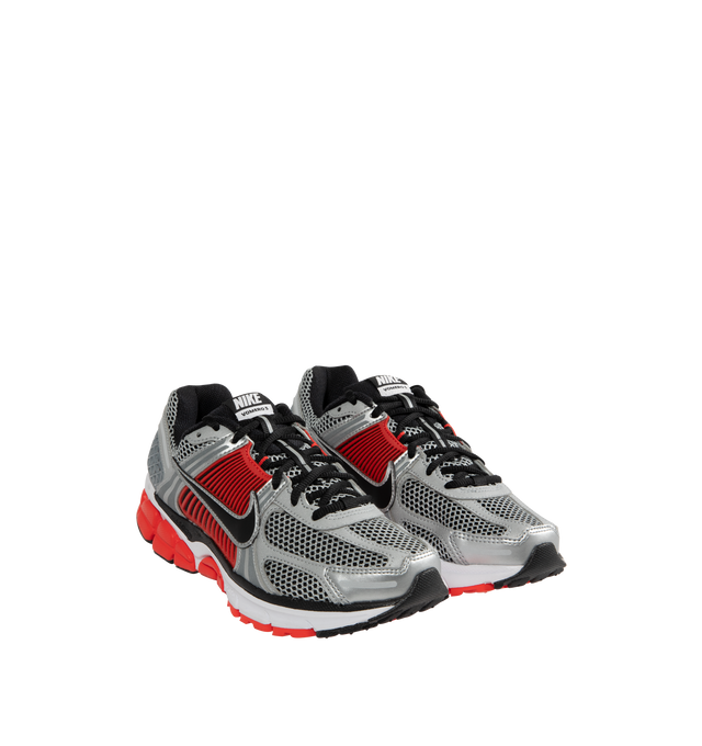 Image 2 of 5 - RED - Nike Zoom Vomero 5 Sneakers are lace-up sneakers featuring mesh with TecTuff and utilitarian overlays that are breathable and durable, cushlon foam with Zoom Air cushioning and rubber tread. 