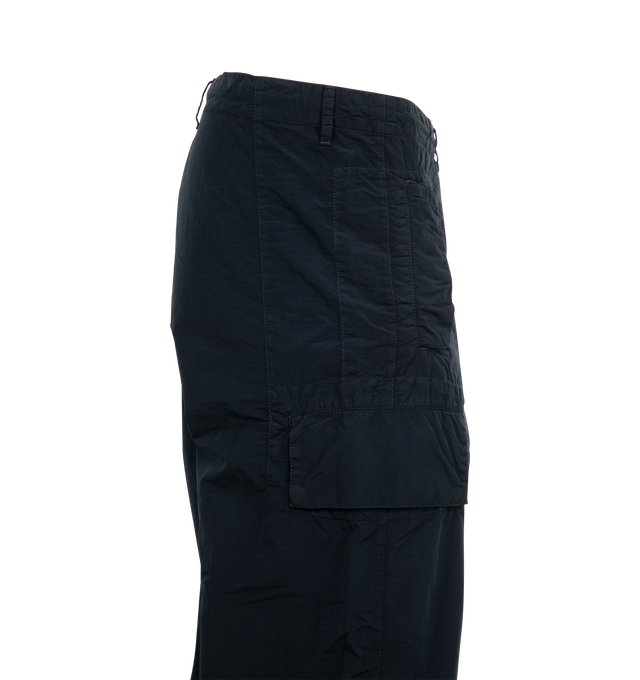 Image 3 of 4 - NAVY - C.P. Company Flatt Nylon Loose Utility Cargo Pants featuring three-pocket styling, zip-fly, cargo pocket at outseam, acetate lens at outseam, tucks at knees and logo patch at back pocket. 100% polyamide. 