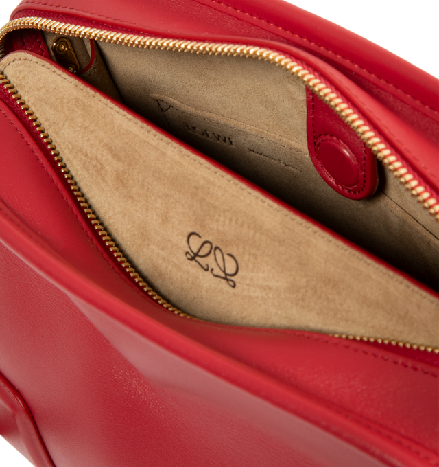Image 5 of 5 - RED - Loewe Small Amazona 180 Bag in leather features a relaxed silhouette anchored by a single toron top handle, designed to be carried open, while a concealed closure secures the main compartment, three carry options: short handle, removable shoulder strap and crossbody, zip closure with two leather zip pullers, two compartments, main compartment closed with magnetic closure, internal flat pocket, left side d-ring for customization, nappa lambskin lining, and embossed double L branding. Lea 