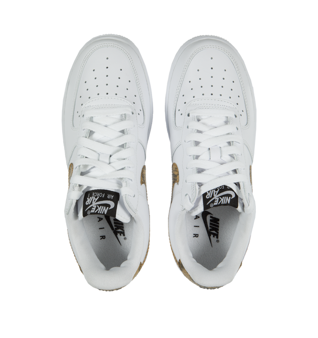 Image 5 of 5 - WHITE - Nike Air Force 1 Low Retro Premium 'Ivory Snake' in the coveted white, elemental gold, and dark hazel colorway. Features Nike Air cushioning, low-cut silhouette, padded collar, foam midsole, perforations on toe and rubber outsole. 