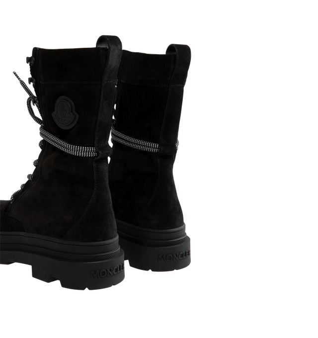 Image 3 of 4 - BLACK - Moncler Women's Vera High Suede & Shearling Lace-Up Boots are crafted from supple suede and long-haired lambskin, combining rugged cold-weather styling with lightweight comfort. Designed with a lace-up closure and a functional back loop that secures the laces while allowing the shaft to be styled structured or slouchy, these calf-height designer boots are finished with a comfortable leather insole and a rubberized TPU sole with micro-foam filler. Upper: Cow Suede and Long-Haired Lambs 