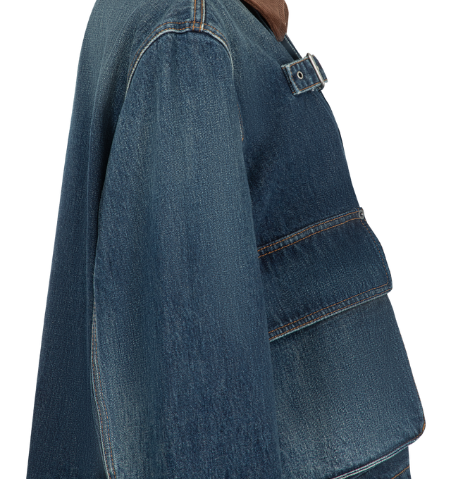 Image 3 of 3 - BLUE - Loewe Women's Denim Parka is crafted from medium-weight washed cotton denim and features a relaxed-fit silhouette, a short length, and a corduroy-effect suede collar. Designed with a concealed zip and snap-button front closure, an adjustable buckle tab at the placket, snap-button cuffs, gusset pockets, and an interior welt pocket, this fully lined style combines workwear-inspired utility with elevated craftsmanship. Main Material: Cotton Denim. Collar: Corduroy-Effect Suede. Fit: Relax 