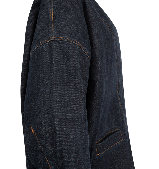 Image 3 of 3 - NAVY - JACQUEMUS Oversized Denim Cardigan featuring dropped shoulders, straight hem, kimono-inspired frame, monogram embroidery, hidden-snap placket, deep V-neck, long sleeves, front welt pockets and lined. 100% cotton. Made in France. 