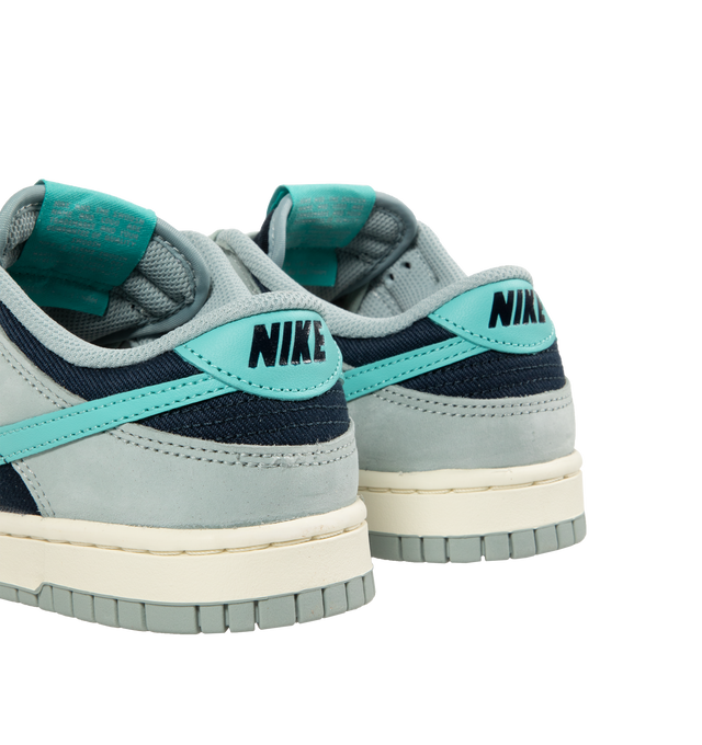 Image 3 of 5 - GREY - Nike Dunk Low Retro Sneakers are a lace-up style with leather uppers, foam midsoles, lightweight cushioning, padded collars, and rubber outsoles.  