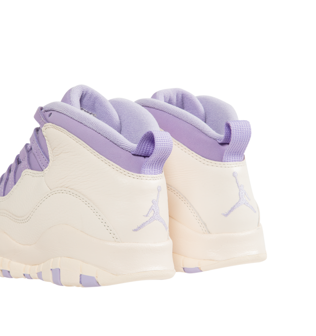 Image 3 of 5 - PURPLE - JORDAN Air Jordan 10 Retro Sneaker featuring tumbled Chalk leather with luxe Hydrangea nubuck blooming on the upper, Jumpman logo on the outsole, full-length Nike Air cushions, lace up closure, foam midsole with encapsulated Air unit and rubber outsole. 