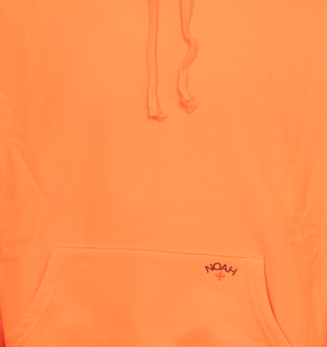 Image 3 of 3 - ORANGE - NOAH Classic Hoodie featuring brushed-back fleece, kangaroo pocket, hood with drawstring, ribbed hem and cuffs and logo embroidery on pocket. 100% cotton. Made in Canada. 
