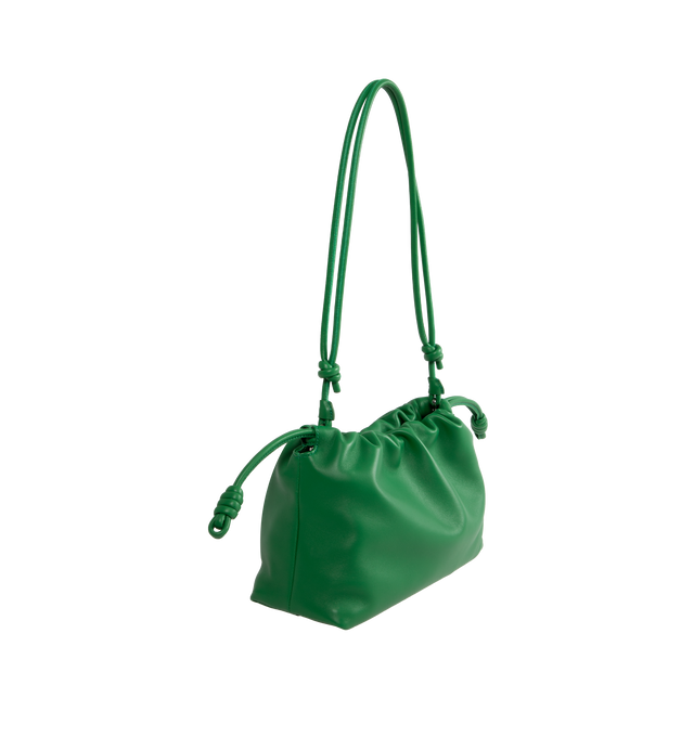 Image 3 of 4 - GREEN - LOEWE Flamenco Purse crafted in mellow nappa lambskin in a ruched design featuring knots at the sides, magnetic closure and detachable donut chain. Versatile and functional, it can be carried as a clutch, worn over the shoulder using the donut chain or crossbody with the accompanying leather strap.  Nappa leather with suede lining. Height 7.9" X Width 11.8" X Depth 4.1". Adjustable Strap length (inches) 37" to 47". Made in Spain. 