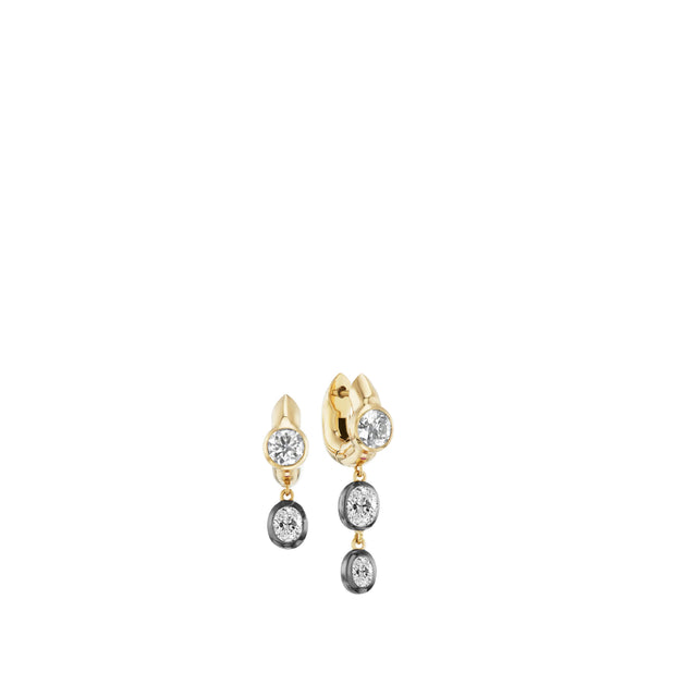 Image 1 of 1 - GOLD - Uniform Object Tusk Drop Earrings featuring 9 g of 18K yellow gold with black rhodium plating, 0.875 TCW round diamonds, and 0.80 TCW oval diamonds (1.68 TCW). Handcrafted in New York City. Hirshleifers offers a range of pieces from this collection in-store. For personal consultation and detailed information about jewelry, please contact our dedicated stylist team at personalshopping@hirshleifers.com. 