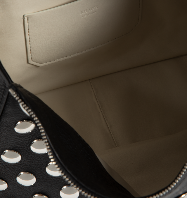 Image 3 of 3 - BLACK - KHAITE Elena Shoulder Bag with Silver Studs featuring a sculptural interpretation of a classic box bag, zip-top silhouette, studded in gleaming discs and lined in nappa leather, with slip pocket. 11 in x 3.5 in x 7.5 in. 100% calfskin, brass. 