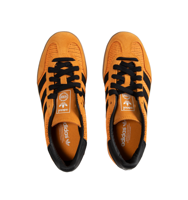 Image 5 of 5 - ORANGE - ADIDAS Gazelle lace-up soccer-inspired adidas shoes made with premium materials. Crafted with a breathable cotton mesh upper with suede overlays, classic T-toe, 3-Stripes and gum rubber outsole. Unisex style in mens sizing. 