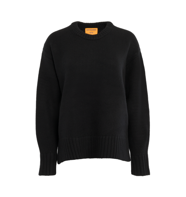BLACK - GUEST IN RESIDENCE Cozy Crew featuring oversized fit, crew neck, dropped shoulder, reverse jersey detail around arm & shoulder with tuck stitch, ribbed neck trim, cuff and hem, side slit at hem and jersey cable. 100% cashmere. 