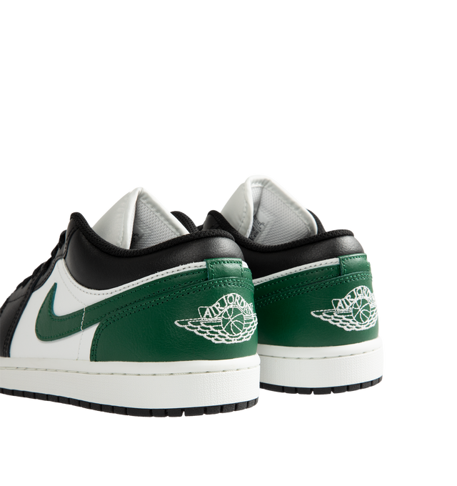 Image 3 of 5 - MULTI - Men's Air Jordan 1 Low Sneakers feature a genuine leather upper with the iconic low-top silhouette for a clean, timeless heritage look. These lifestyle sneakers combine encapsulated Air-Sole cushioning with a durable rubber outsole for lightweight comfort, lasting support, and reliable everyday traction. Main Material: Genuine Leather. Midsole: Encapsulated Air-Sole Unit. Sole: Rubber. 