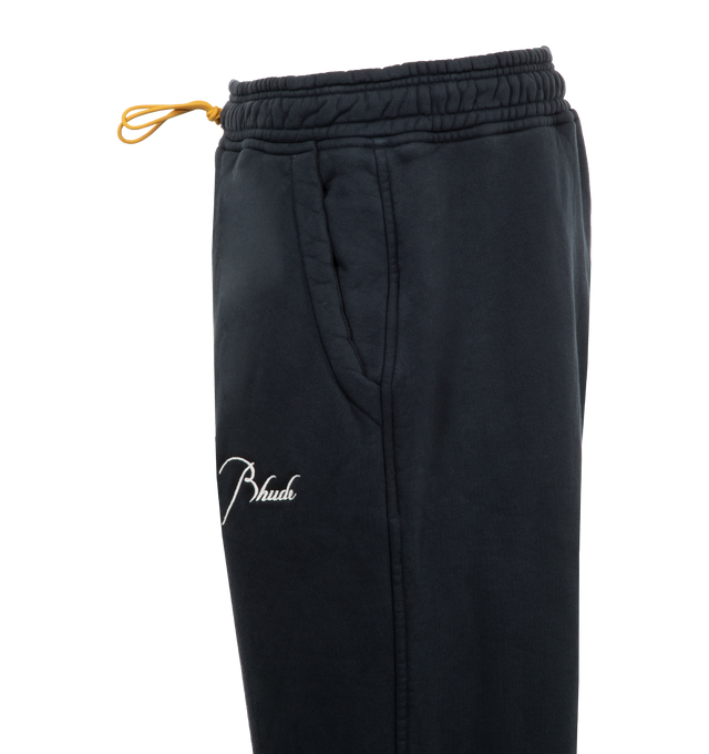 Image 3 of 3 - BLACK - Rhude Classic Sweatpants have an elastic drawstring waist, side pockets, and back patch pockets. 100% cotton. 