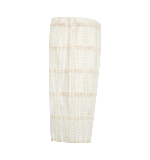 Image 3 of 3 - WHITE - Issey Miyake Men's Lace Grid Pleats Pants are crafted from a lightweight polyester and cotton blend and feature the house's signature pleated construction with a distinctive grid-inspired texture. Designed with an elasticated drawstring waistband for an adjustable fit, these designer pants are finished with a button-fly front and functional side pockets, combining innovative textile design with everyday comfort. Main Material: 75% Polyester, 25% Cotton. Waist: Elasticated with Drawstr 