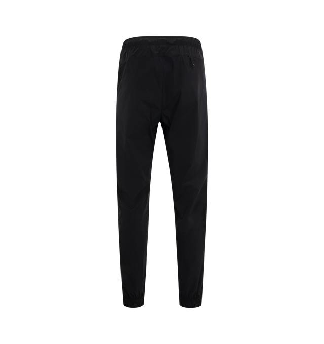 Image 2 of 3 - BLACK - MONCLER Logo Patch Jogging Pants featuring recycled bi-stretch nylon, waistband with elastic drawstring fastening, zipped pockets, elastic cuffs and silicone logo patch. 80% polyamide/nylon, 20% elastane/spandex. Made in Bulgaria. 