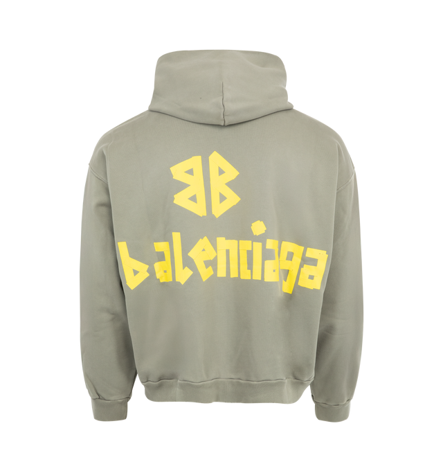 Image 2 of 2 - GREEN - BALENCIAGA Ripped Pocket Hoodie featuring hood without drawstring, dropped shoulders, ripped out kangaroo pocket at front, 1 slash pocket on each side, New Tape Type TR logo at front and back, destroyed and washed-out effect. 100% cotton. Made in Portugal. 