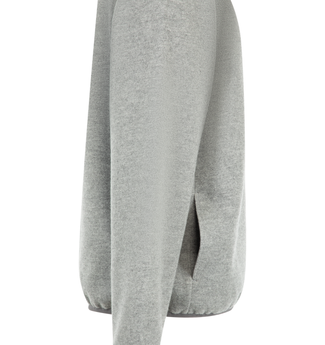 Image 3 of 3 - GREY - The Row Men's Maury Sweater is crafted from soft cotton fleece and features a relaxed silhouette with a high-neck collar, long sleeves, and an elasticated hem. Designed with a Henley-style front placket with snap-button closure and discreet side-seam pockets, this designer pullover reflects The Row's refined approach to elevated everyday essentials. Main Material: 100% Cotton. Fit: Relaxed. Closure: Snap-Button Henley Placket. Pockets: Side-Seam Pockets. Made in Italy. 