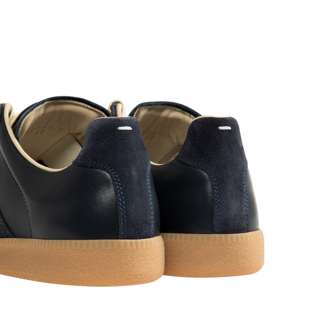 Image 3 of 5 - NAVY - MAISON MARGIELA Replica Sneakers featuring lace-up sneakers in buffed nappa calfskin and calfskin suede, contrasting sole, Maison Margiela logo label on the tab, internal Replica label, internal elastic and all-over Maison Margiela logo insole. 100% calf leather. Sole: 100% rubber. Made in Italy. 