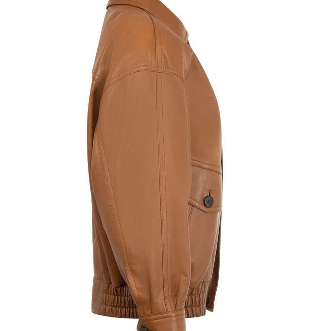 Image 3 of 4 - BROWN - SAINT LAURENT Bomber Jacket in lambskin featuring drop shoulders, a shirred waist, cotton and viscose lining, zip closure with snap-button storm flap, two patch pockets with button flat and two jetted pockets at the front, one inner welt pocket, pointed collar, one-button cuffs and padded shoulders. 100% lambskin. Made in Italy. 