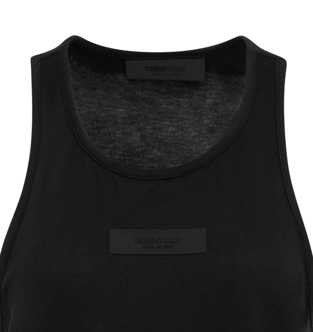 Image 2 of 2 - BLACK - Fear of God Essentials tank top made in a cotton tri-blend jersey to provide softness and comfort. The U-neck tank fits relaxed in the body with dropped arm holes. New minimalist branding is seen in the rubberized Essentials Fear of God black bar on the center front. 53% cotton, 40% polyester, 7% rayon. 