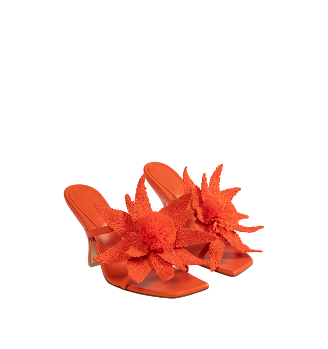 Image 2 of 4 - ORANGE - BOTTEGA VENETA Adam Sandal featuring leather mule sandal with raffia flower embroidery and rubber-injected leather outsole. Lambskin, raffia. Heel: 3.5. Made in Italy. 