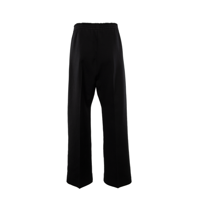 Image 2 of 4 - BLACK - FEAR OF GOD Single Pleat Wide Leg Trousers featuring elastic waist with drawstring, wide leg, low-crotch style, mid-weight and non-stretchy fabric. 56% cotton, 43% virgin wool, 1% nylon. Lining: 100% cotton. 