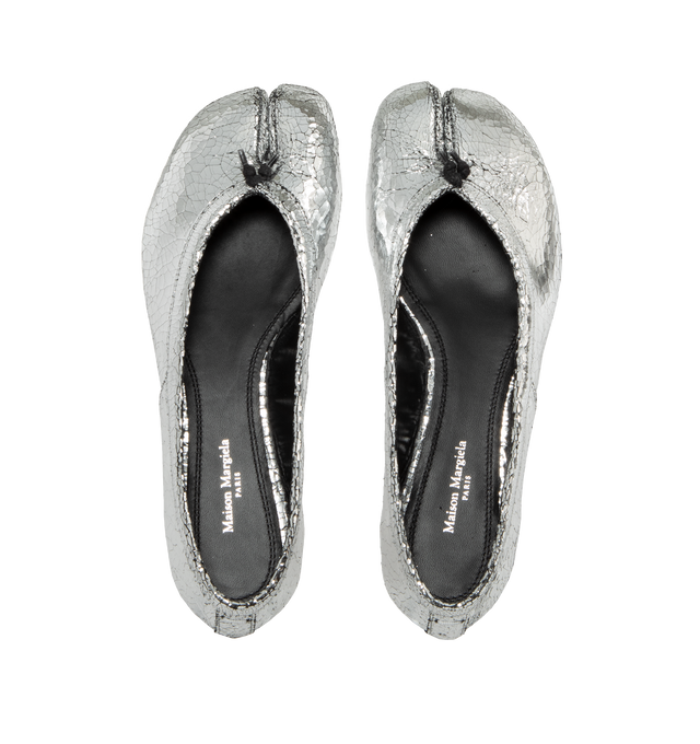 Image 4 of 4 - SILVER - Maison Margiela Tabi new ballerinas in a broken mirror finish, crafted from soft nappa leather.  Featuring white stitch detail at the back, cotton knot, Maison Margiela logo on the sole, and the Tabi split-toe shape, inspired by the traditional 15th century Japanese sock bearing the same name. Upper: 100% calf leather, Lining: 100% calf leather, Sole: 100% calf leather, Contrast: 100% rubber. Made in Italy. 