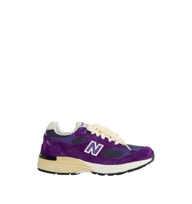 Image 1 of 5 - PURPLE - New Balance Made in USA 993 Sneaker 993 in a streamlined design with fine-tuned the ABZORB midsole cushioning, mesh upper, overlaid with premium nubuck, outfitted in a vivid interstellar purple, atop a dual color white and off-white midsole with reflective accents.  ABZORB midsole absorbs impact through a combination of cushioning and compression resistance.  ACTEVA cushioning delivers versatile, flexible support. Full-length rubber outsole with Ndurance rubber heel for added durabil 