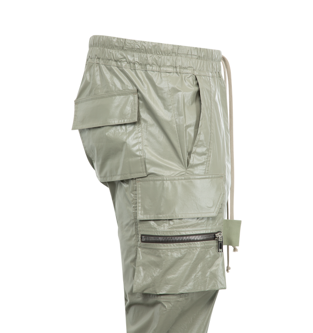 Image 3 of 3 - GREEN - RICK OWENS Mastodon Cargo Pants featuring coated GOTS-certified organic cotton, drawstring at elasticized waistband, four-pocket styling, button fly, rib-knit cuffs and cargo and zip pocket at outseams. 100% cotton. Made in Italy. 