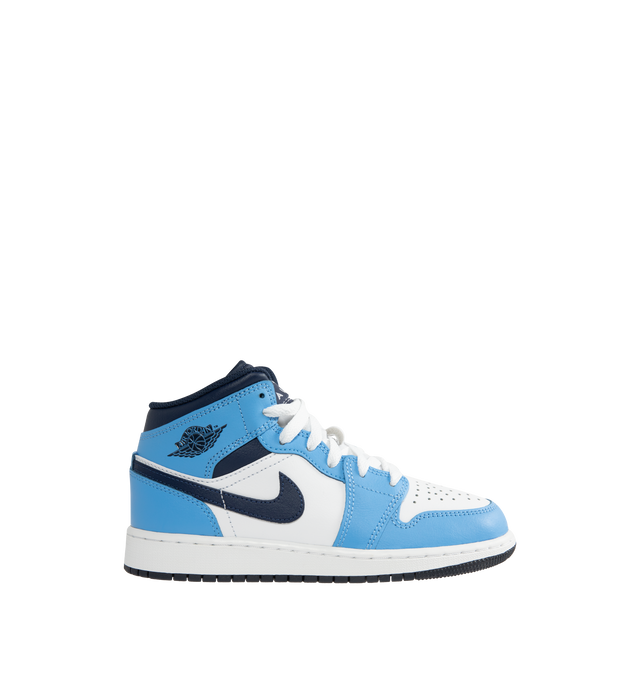 Image 1 of 5 - BLUE - Men's Air Jordan 1 Mid Sneakers feature a leather, synthetic leather, and textile upper with the iconic mid-top silhouette for a timeless heritage look. These lifestyle sneakers combine lightweight Nike Air cushioning, a foam midsole, and a durable rubber outsole with a pivot-circle traction pattern for lasting comfort, support, and reliable grip. Main Material: Leather, Synthetic Leather, and Textile. Midsole: Foam with Nike Air Cushioning. Sole: Rubber. 