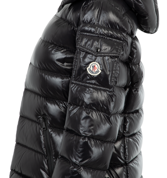 Image 3 of 3 - BLACK - MONCLER Bady Jacket featuring nylon laqu lining, down-filled, detachable hood with snap buttons, adjustable with elastic drawstring fastening, patch flap pocket on the sleeve, zipper closure, double pocket with zipper closure and adjustable elastic cuffs with snap buttons. 100% polyamide/nylon. Padding: 90% down, 10% feather. 