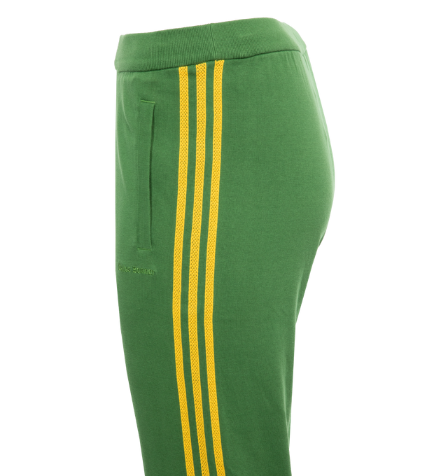 Image 3 of 5 - GREEN - ADIDAS X WALES BONNER Knit Track Pants featuring elastic waistband and cuffs at hem, logo details and two front pockets. 100% cotton. 