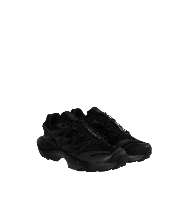Image 2 of 5 - BLACK - SALOMON XT-6 Advanced Sneaker featuring a mesh base with tonal TPU overlays, quicklace lacing system, Salomon branding is found on the tongue and heel and a lugged Contagrip outsole. 