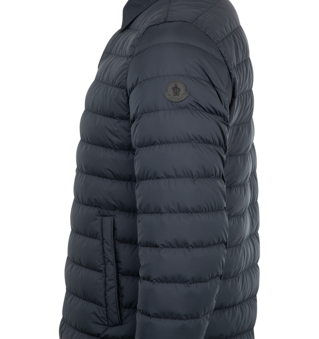 Image 3 of 3 - NAVY - MONCLER Bourdon Down Shirt Jacket featuring AirSoft lining, down-filled, zipper and snap button closure, pockets with snap button closure, zipped inner pocket, adjustable cuffs and leather logo patch. 100% polyester. Padding: 90% down, 10% feather. 