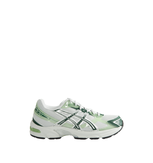 Image 1 of 5 - GREEN - Asics Unisex Gel-1130 Sneakers feature patent leather overlays, clear gloss TPU accents, and breathable mesh underlays for a modern look. Enhanced with cushioning and support designed for all-day comfort, the GEL-1130 delivers the perfect blend of heritage performance and everyday wearability. Main Material: Mesh Upper with Patent Leather and Gloss TPU Overlays. Cushioning: GEL Technology. Details: GEL-1000 Series Heritage Design, Breathable Mesh Construction *Unisex style in men's si 