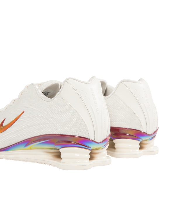 Image 3 of 5 - WHITE - NIKE Shox Z SE Sneaker featuring low-profile, slim, stitchless upper, iconic column design, vibrant Nike Swoosh, metallic accents and a modified, circular Waffle outsole. 