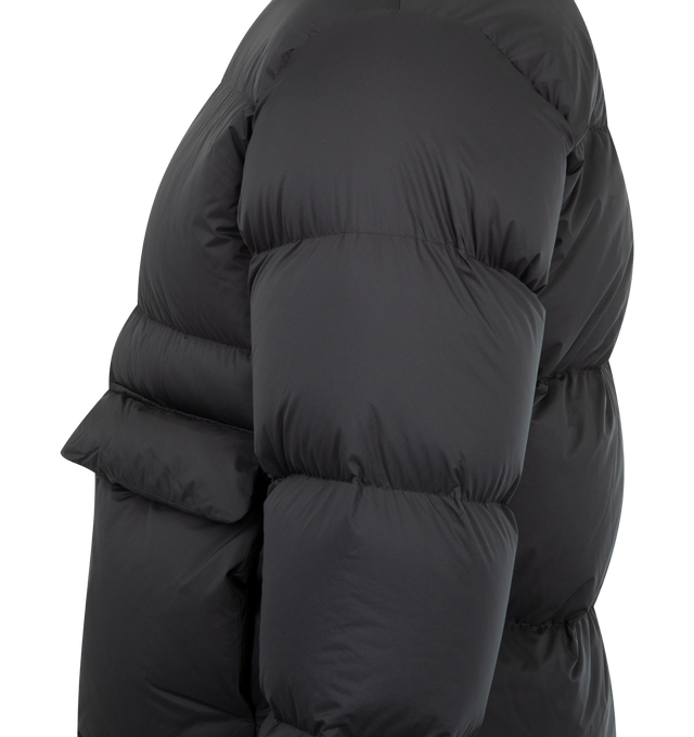 Image 3 of 3 - BLACK - AURALEE Super Light Nylon Ripstop Down Blouson featuring zipper closure on front, stand collar, british white duck down filling, flap pockets on front with snap button closure, welt pockets on side, adjustable hem with drawstring, windproof and water-repellent, cuffs with snap button closure and relaxed fit. 100% nylon. 