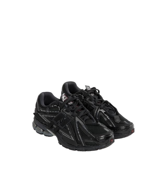 Image 2 of 5 - BLACK - New Balance 1906A Sneakers are a lace-up style with leather, textile, and mesh uppers, ACTEVA LITE midsole cushions, ABZORB SBS heel cushions, N-energy outsoles, and Stability Web outsole technology. 