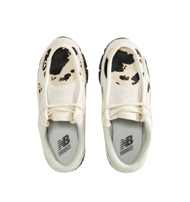 Image 5 of 5 - CREAM - New Balance 1890A Sneakers feature a progressive silhouette that combines everyday comfort with an elevated, formal-inspired design. Crafted with a premium leather apron upper, this versatile style is equipped with ABZORB midsole cushioning for superior impact absorption and ABZORB SBS heel cushioning for enhanced stability and comfort. Finished with an ultra-stable heel construction, the 1890A seamlessly blends performance heritage with refined styling. Main Material: Leather Upper.  